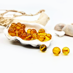 Round amber beads - Honey color