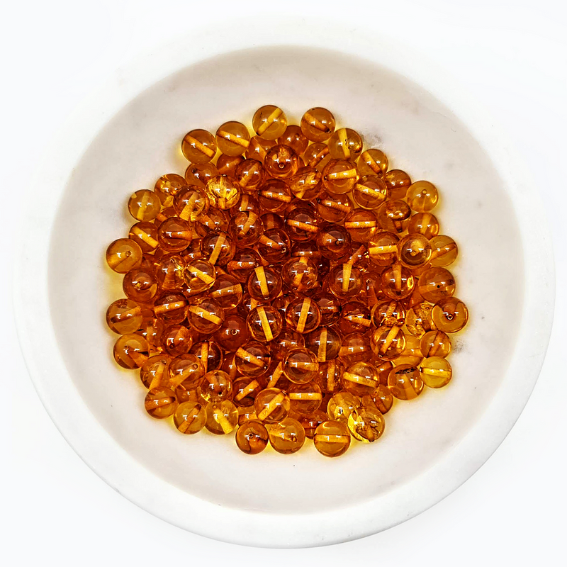 Round amber beads - Honey color