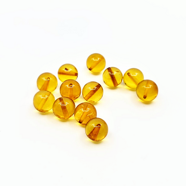 Round amber beads - Honey color
